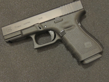 Glock_19_Gen_4_pistol_black_background